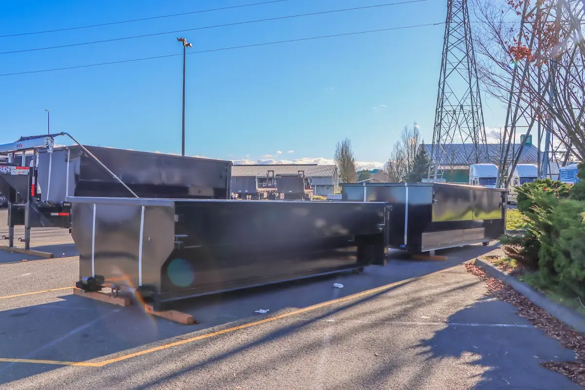 Roll-off dumpster ready for waste disposal at job site for 12 Yard Dumpster Rental in Southgate